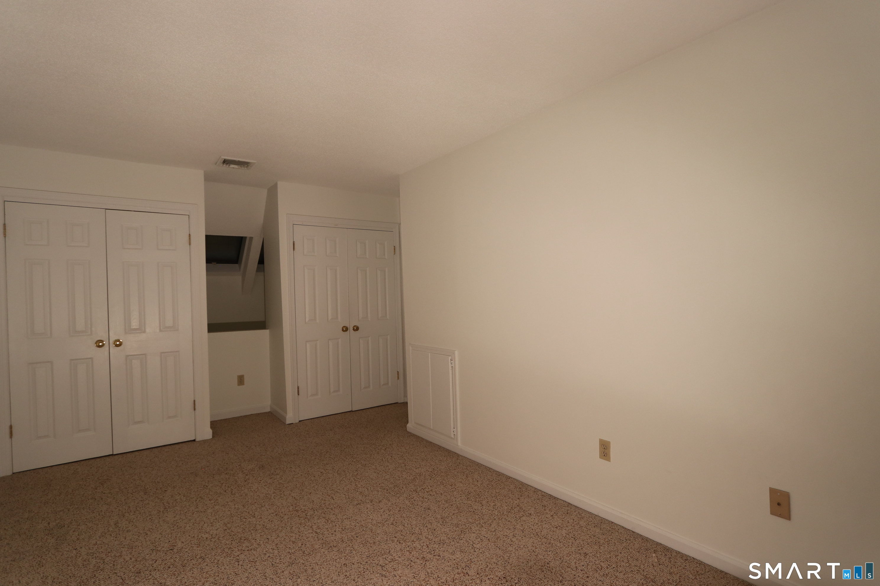 50 Wilton Crest Road, Unit 50 Wilton, CT 06897 - Photo 22 of 31 Bedroom 2 on the upper floor