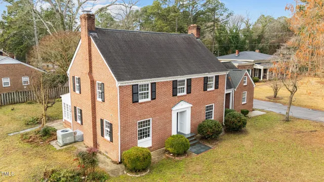 a view of a flower in a yard