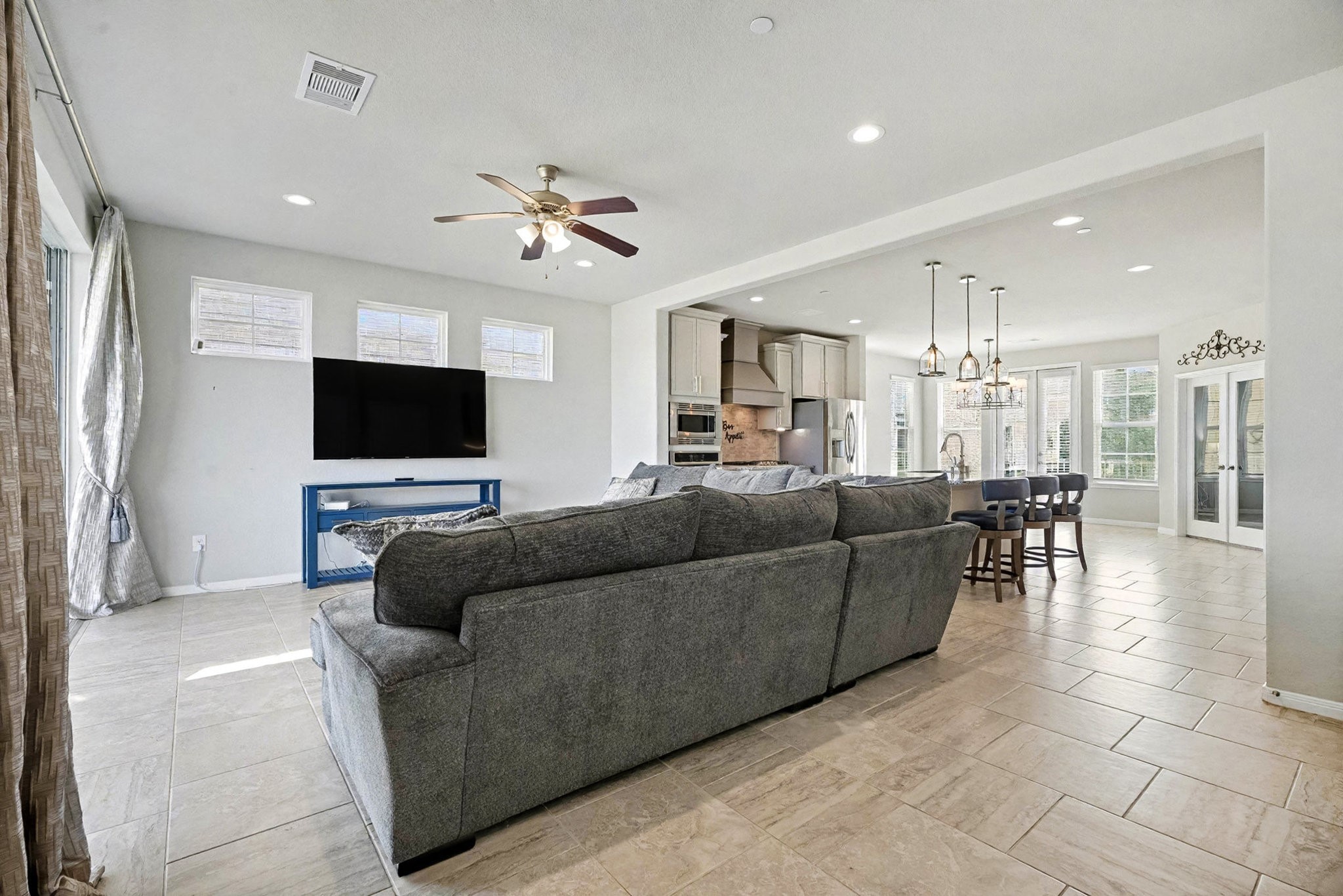 1412 Veranda Mist League City, TX 77573 - Photo 12 of 35 a living room with furniture and a flat screen tv