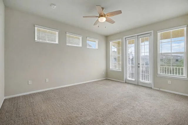 a bathroom with a double vanity sink mirror and shower