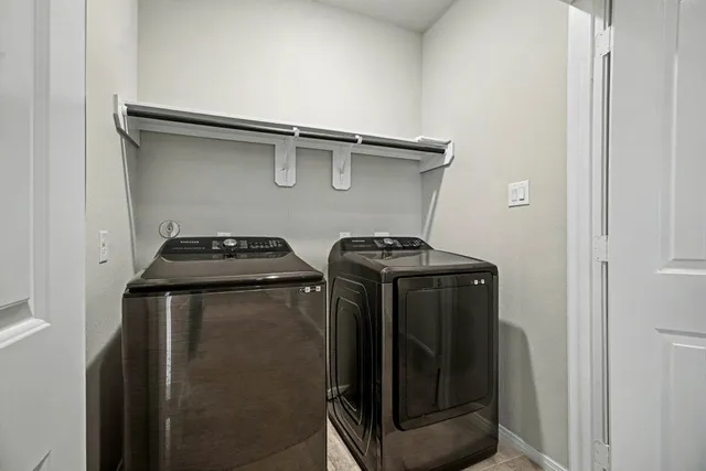 a view of an apartment with a garden and plants