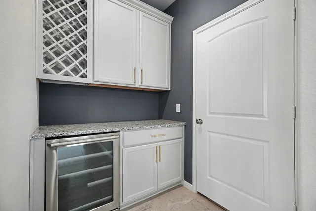 a view of a balcony with wooden floor