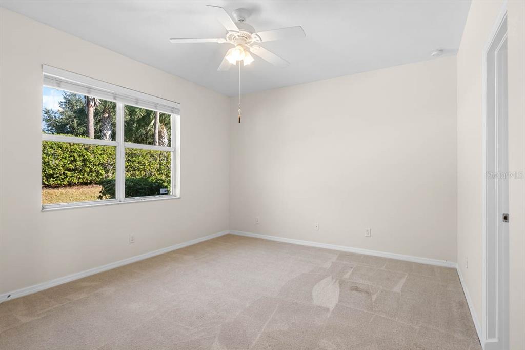 16252 Amethyst Key Drive Wimauma, FL 33598 - Photo 19 of 47 an empty room with a window