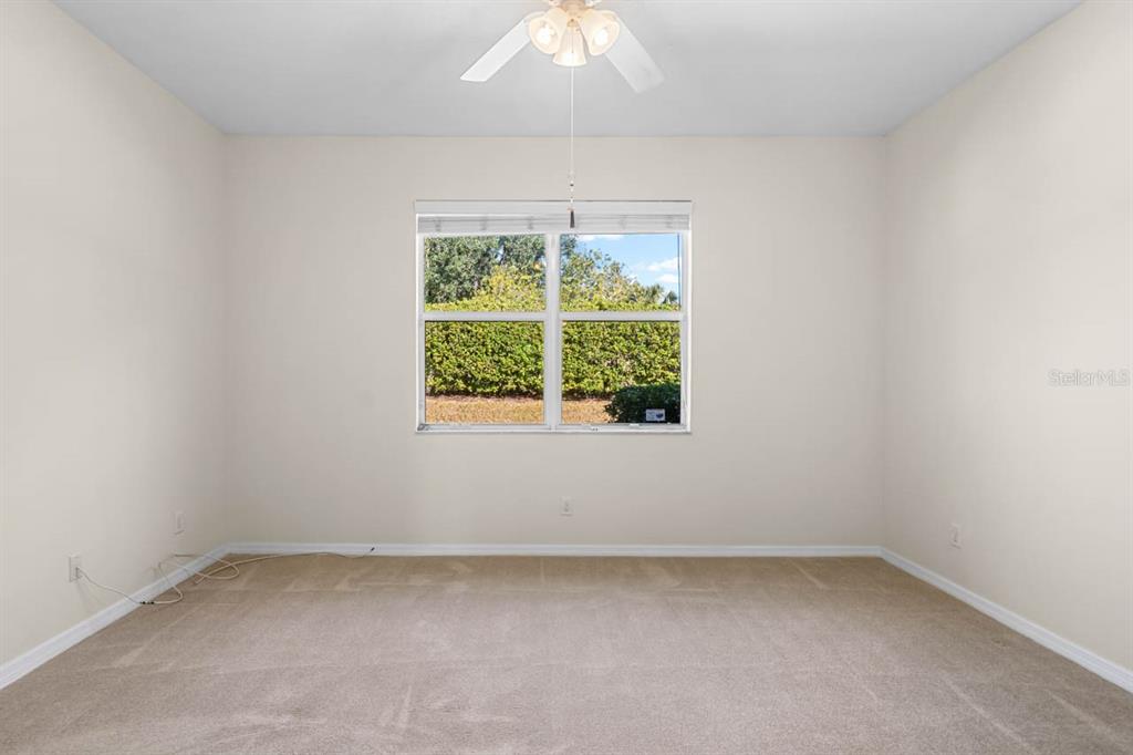 16252 Amethyst Key Drive Wimauma, FL 33598 - Photo 21 of 47 an empty room with a window
