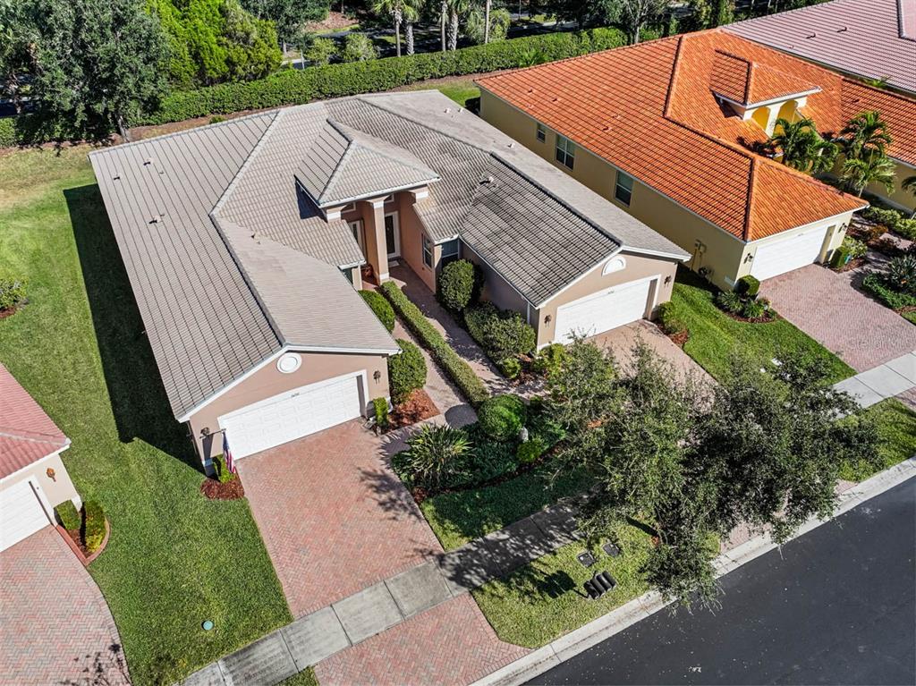 16252 Amethyst Key Drive Wimauma, FL 33598 - Photo 32 of 47 a aerial view of a house with a yard