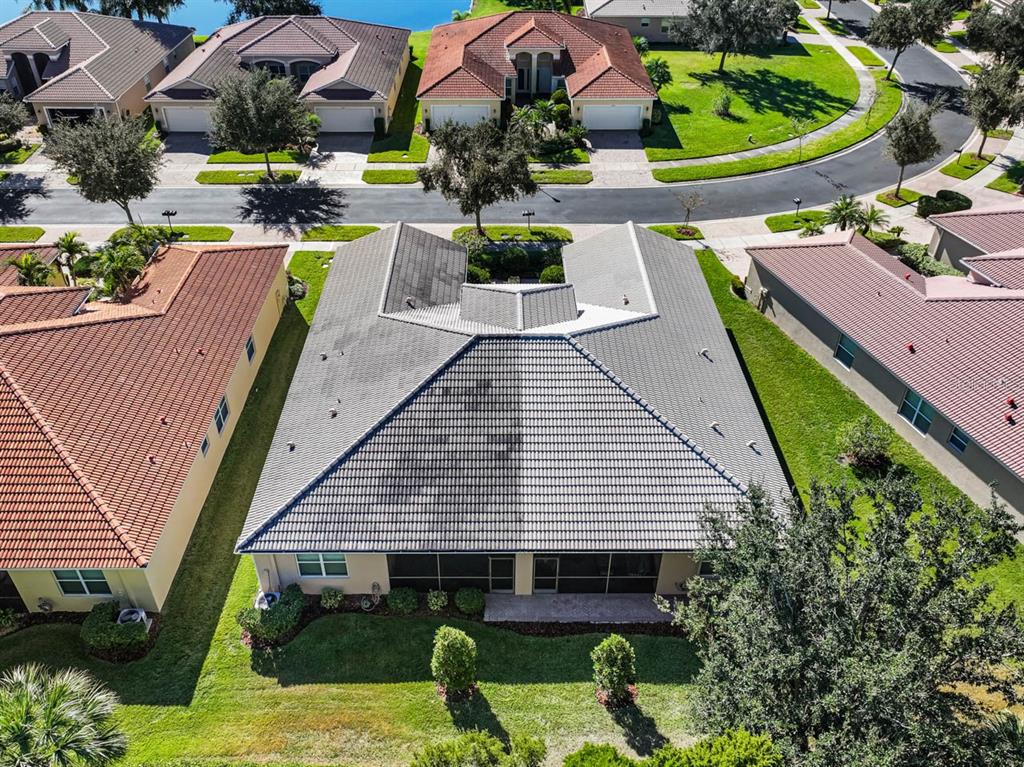 16252 Amethyst Key Drive Wimauma, FL 33598 - Photo 33 of 47 an aerial view of a house with garden space and street view