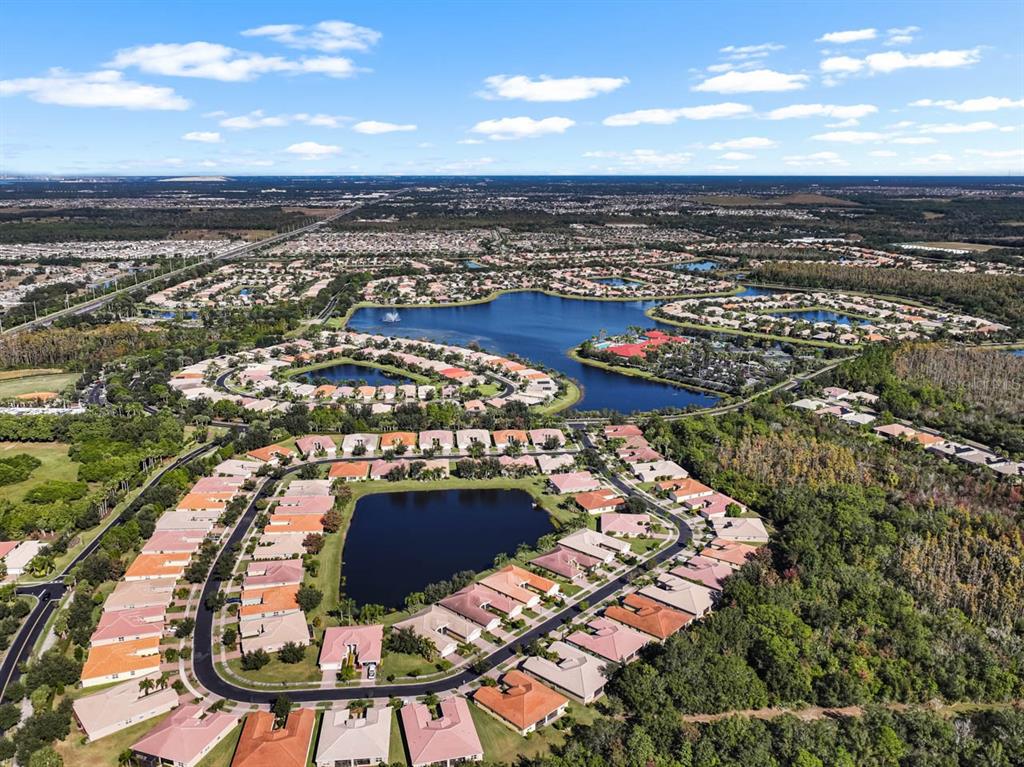 16252 Amethyst Key Drive Wimauma, FL 33598 - Photo 38 of 47 an aerial view of residential houses with outdoor space