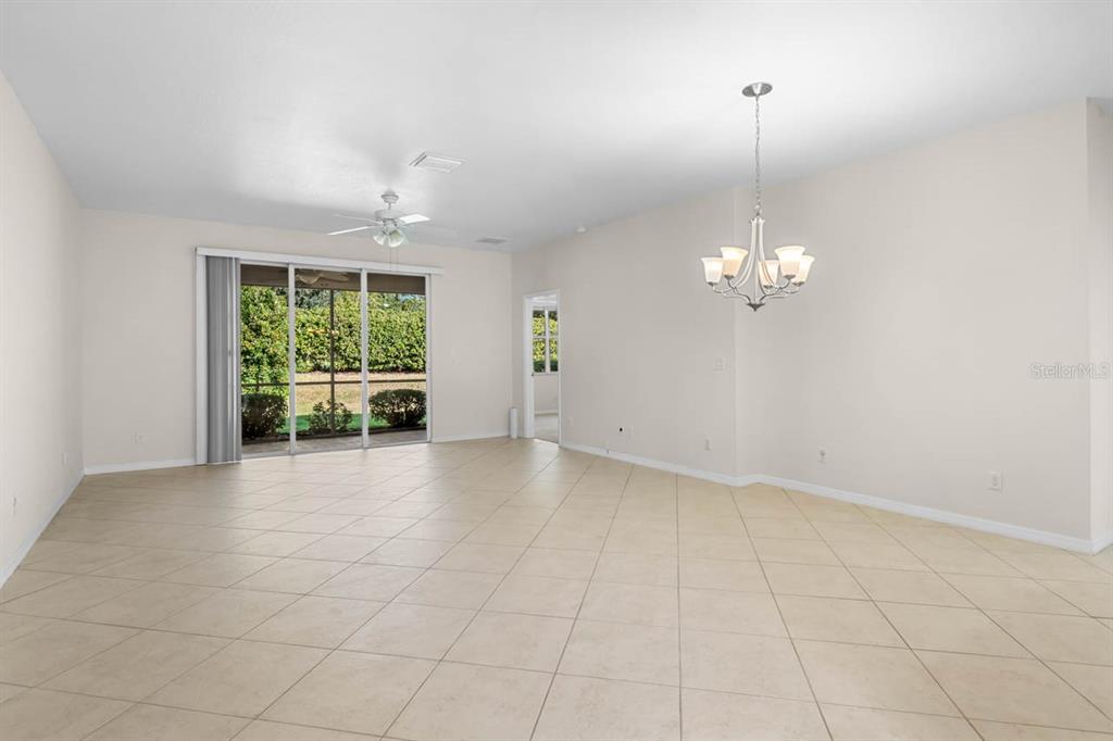 16252 Amethyst Key Drive Wimauma, FL 33598 - Photo 6 of 47 a view of an empty room with a window