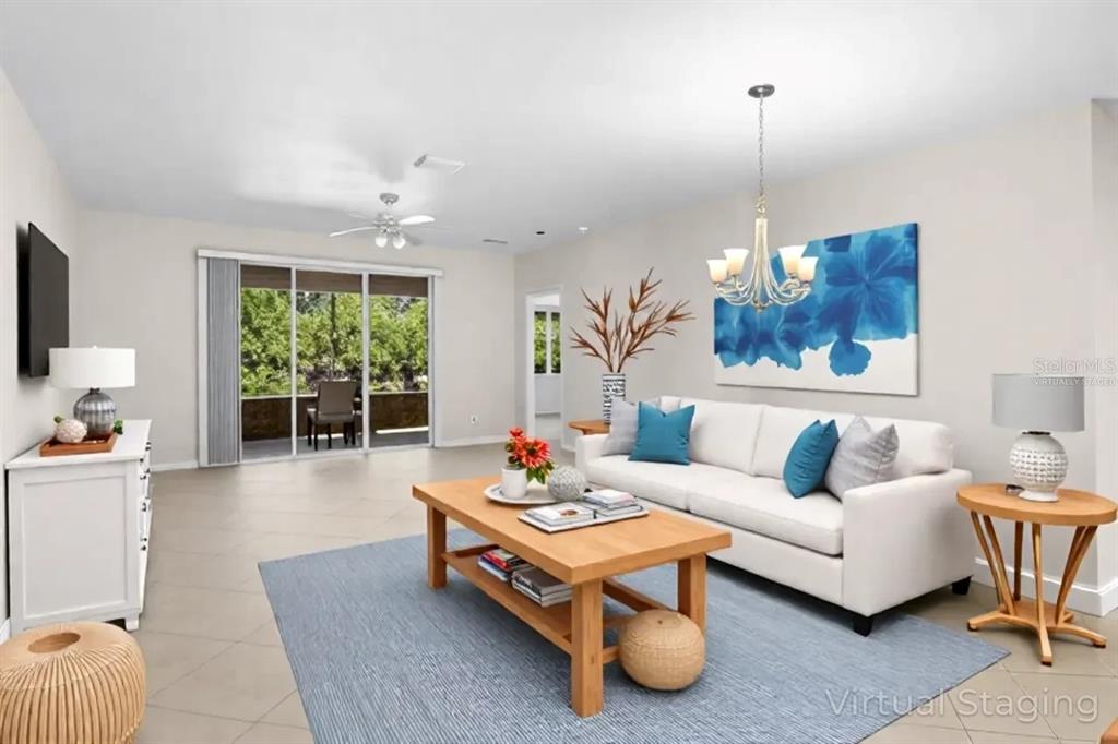 16252 Amethyst Key Drive Wimauma, FL 33598 - Photo 7 of 47 a living room with furniture and a wooden floor