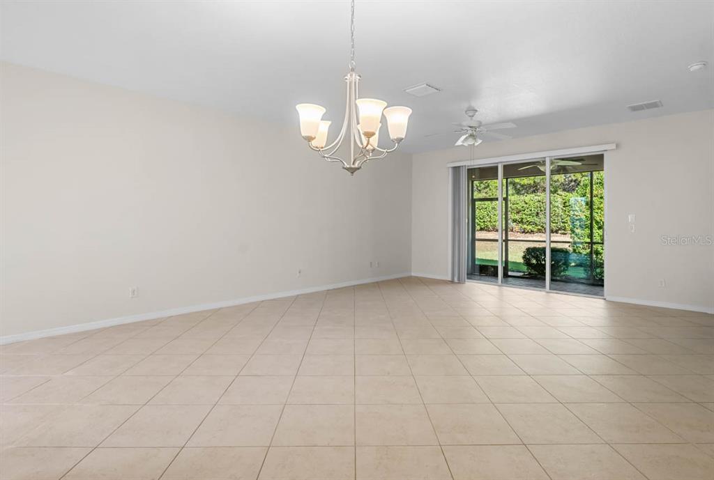 16252 Amethyst Key Drive Wimauma, FL 33598 - Photo 10 of 47 a view of an empty room with a window