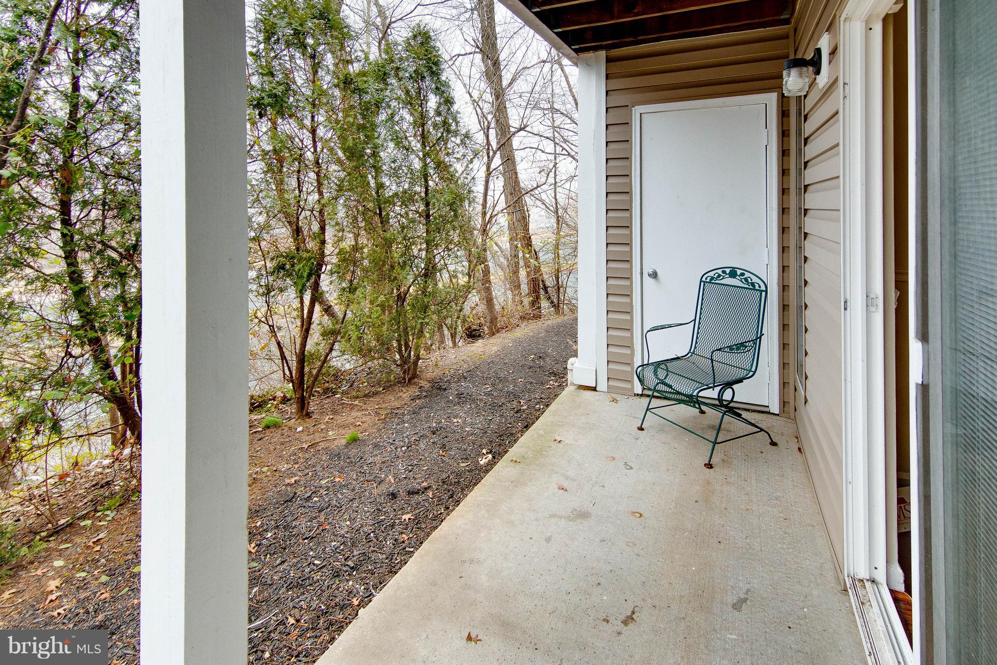 6702 Ridge Road Rosedale, MD 21237 - Photo 3 of 24 Sliders from living room to rear patio