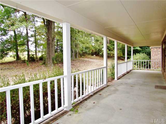 5000 Holly Ridge Farm Road Raleigh, NC 27616 - Photo 3 of 25 a view of a porch