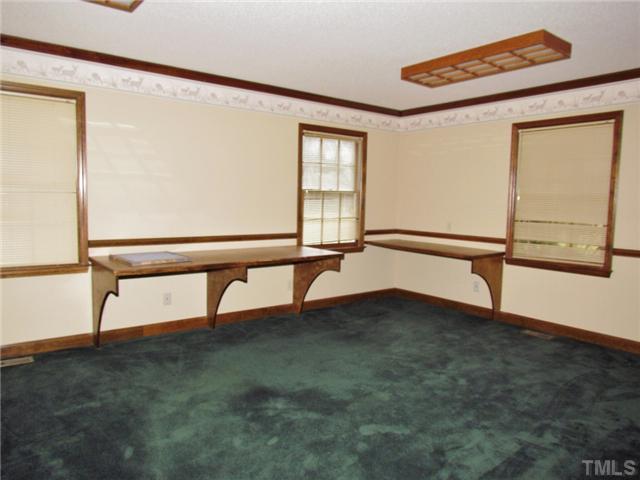 5000 Holly Ridge Farm Road Raleigh, NC 27616 - Photo 22 of 25 a view of an empty room