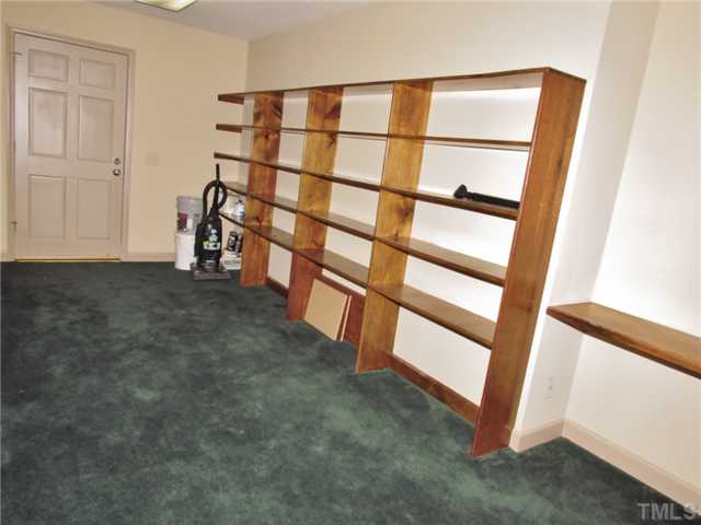 5000 Holly Ridge Farm Road Raleigh, NC 27616 - Photo 24 of 25 a view of an empty room with a window