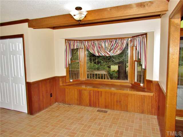 5000 Holly Ridge Farm Road Raleigh, NC 27616 - Photo 7 of 25 a view of a room with a large window