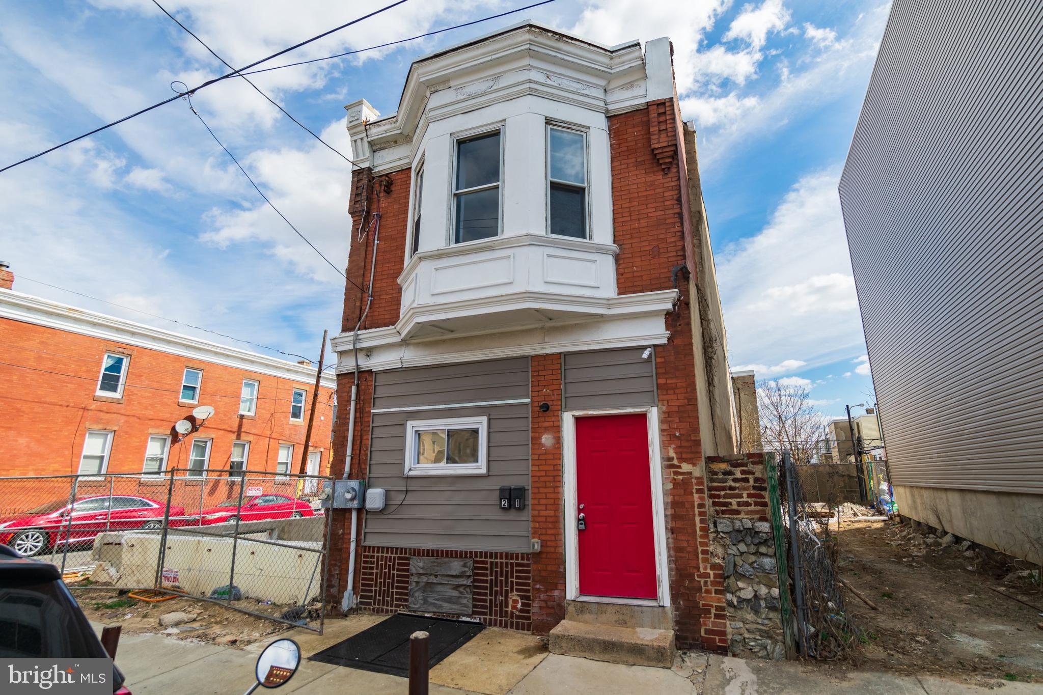 1833 South 22nd Street, Unit 2 Philadelphia, PA 19145 - Photo 15 of 15 a front view of a building with street view