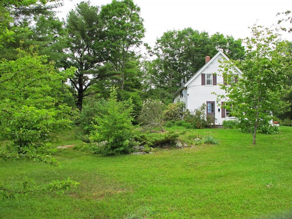 22 Dodge Road Edgecomb, ME 04556 - Photo 3 of 21 The maturing trees give the home...