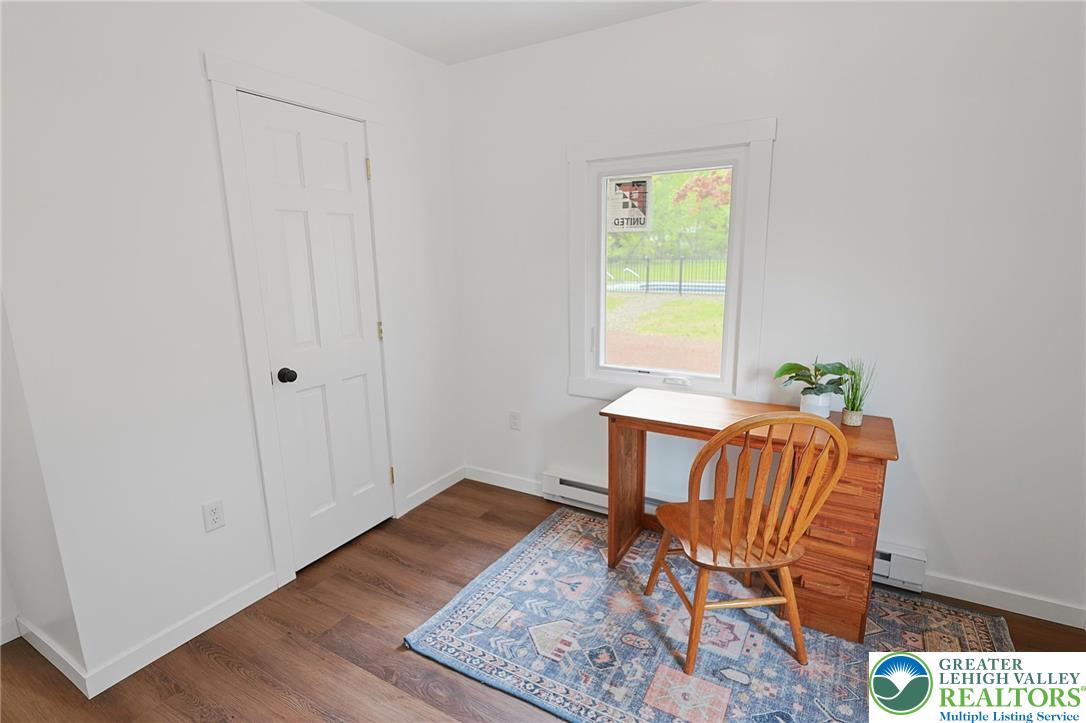 121 Ben Titus Road Tamaqua, PA 18252 - Photo 32 of 48 a living room with furniture and a window