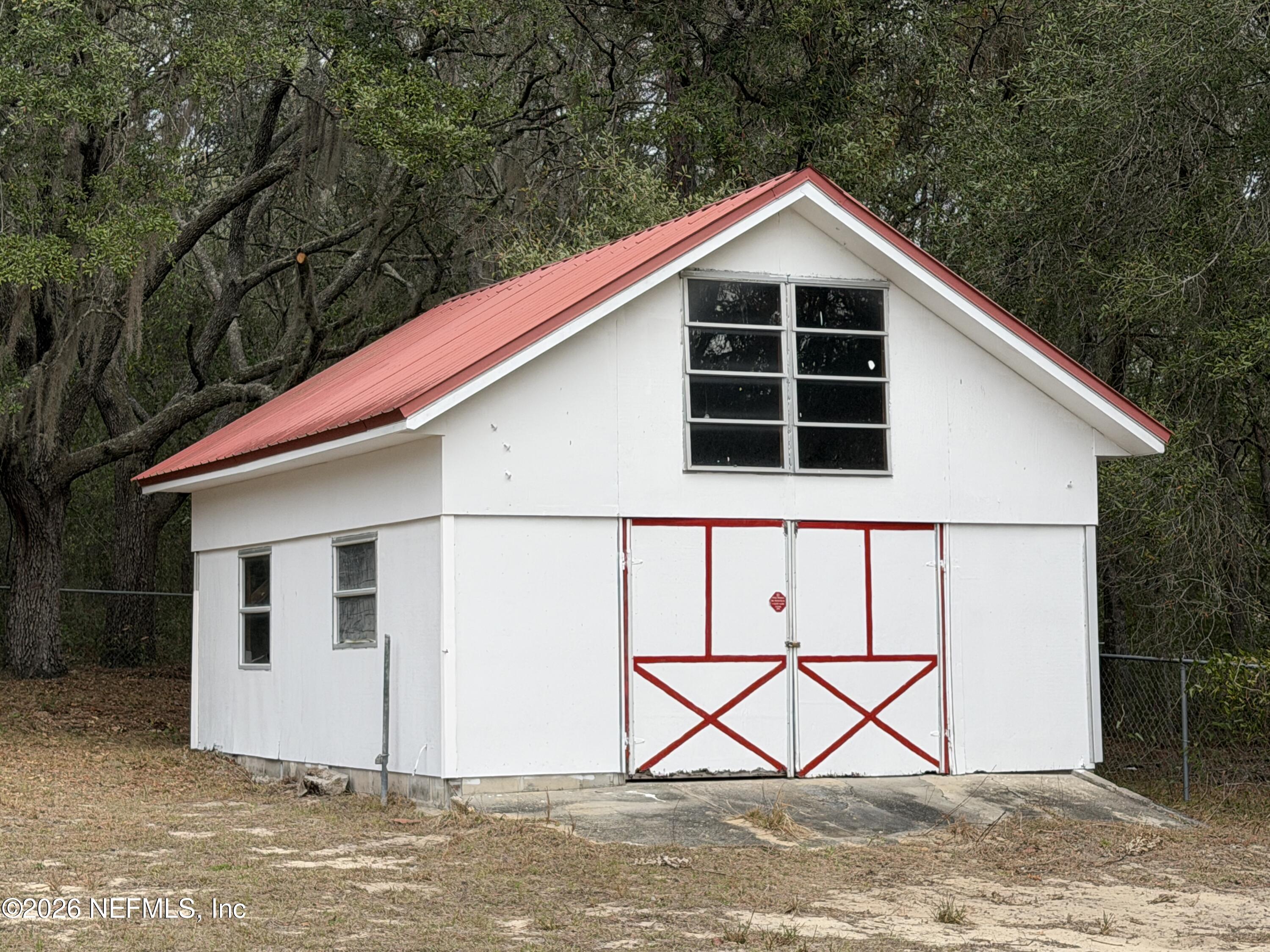 110 Kitty Lane Interlachen, FL 32148 - Photo 5 of 14 a front view of a house with a yard