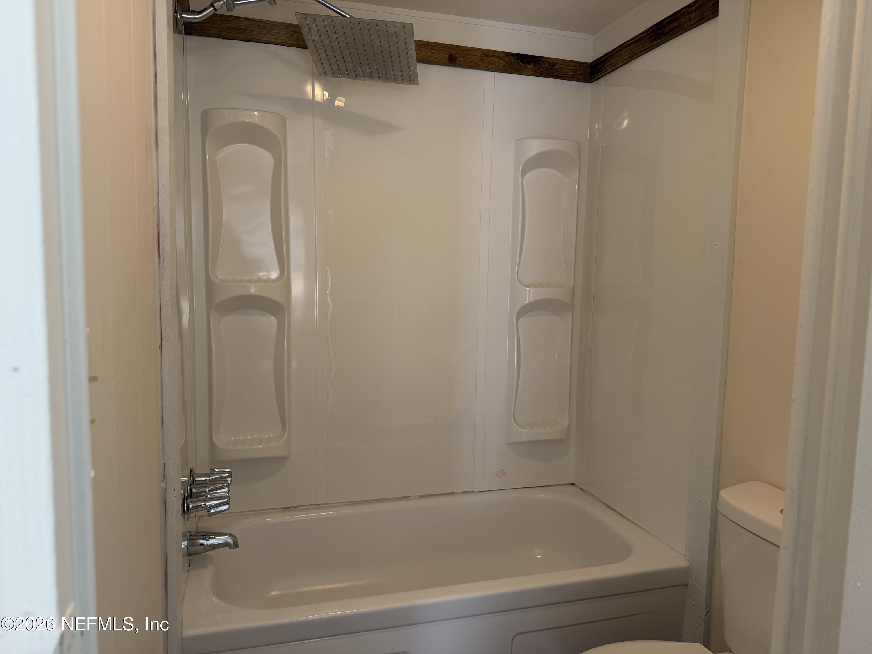 110 Kitty Lane Interlachen, FL 32148 - Photo 8 of 14 a bathroom with a shower