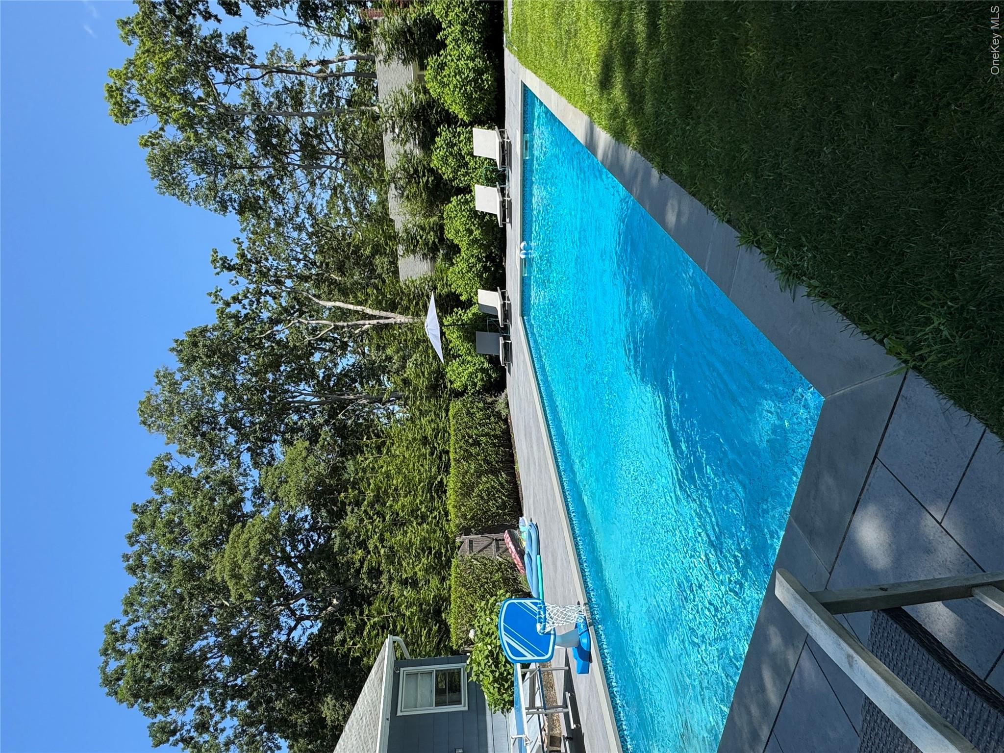 870 Noyack Road Southampton, NY 11968 - Photo 2 of 19 a view of a house with backyard