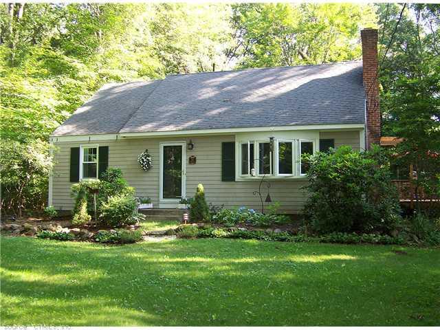 34 Hickory Hill Road Simsbury, CT 06070 - Photo 1 of 1 a view of a house with a yard and a garden