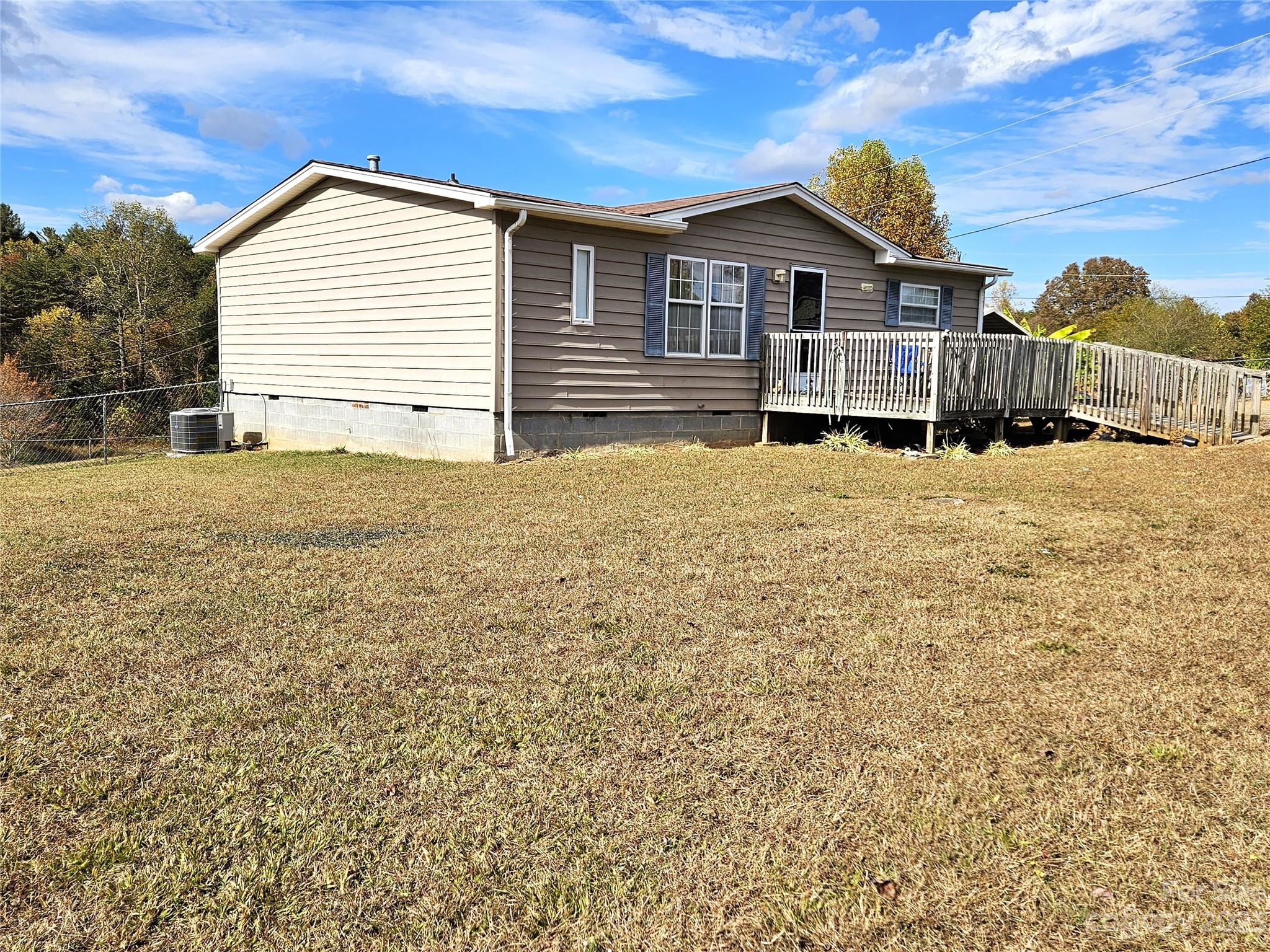 2955 Piney Road Morganton, NC 28655 - Photo 11 of 43 a view of a house with a yard