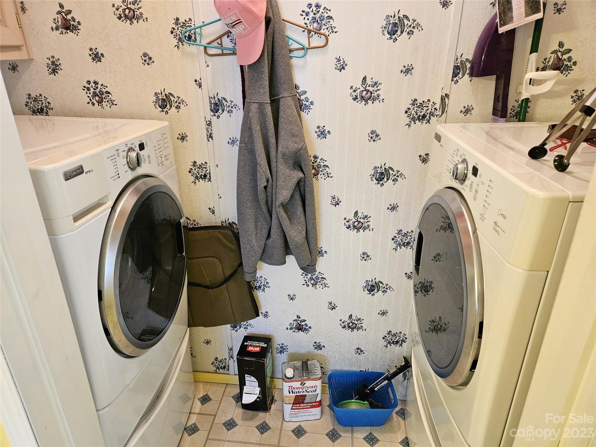2955 Piney Road Morganton, NC 28655 - Photo 16 of 43 a utility room with dryer and washer