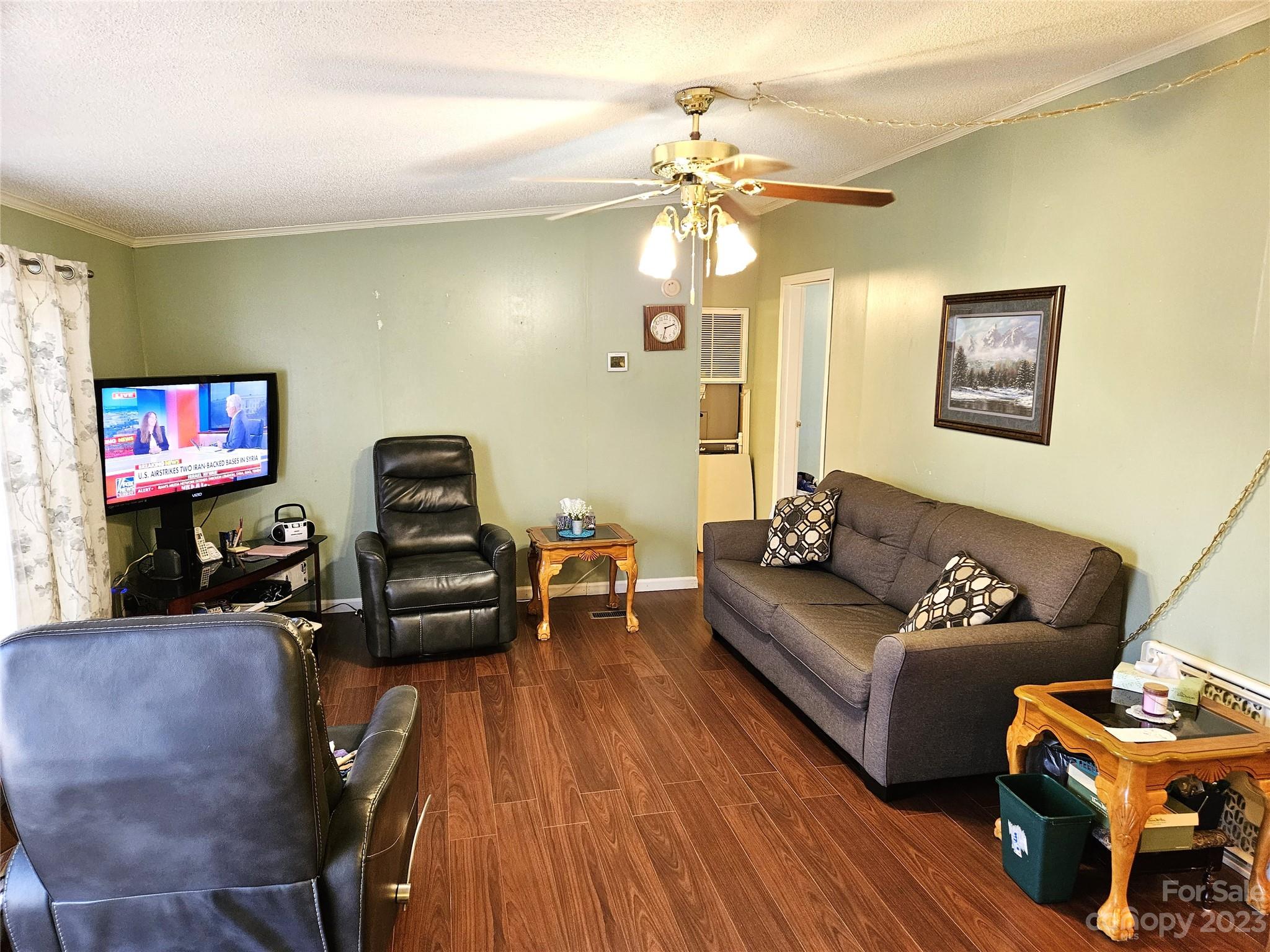 2955 Piney Road Morganton, NC 28655 - Photo 20 of 43 a living room with furniture and a flat screen tv