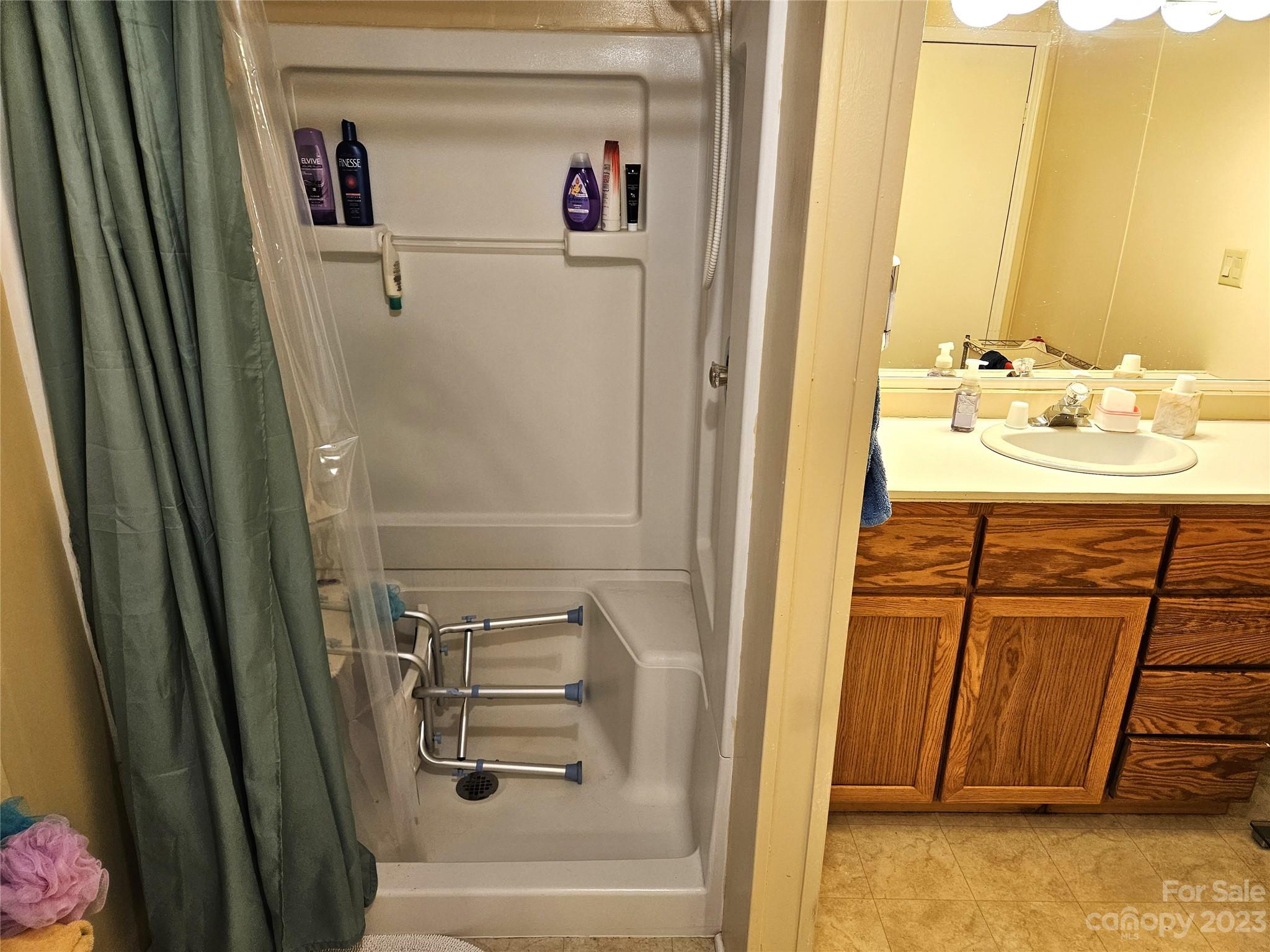 2955 Piney Road Morganton, NC 28655 - Photo 22 of 43 a bathroom with a shower and a sink