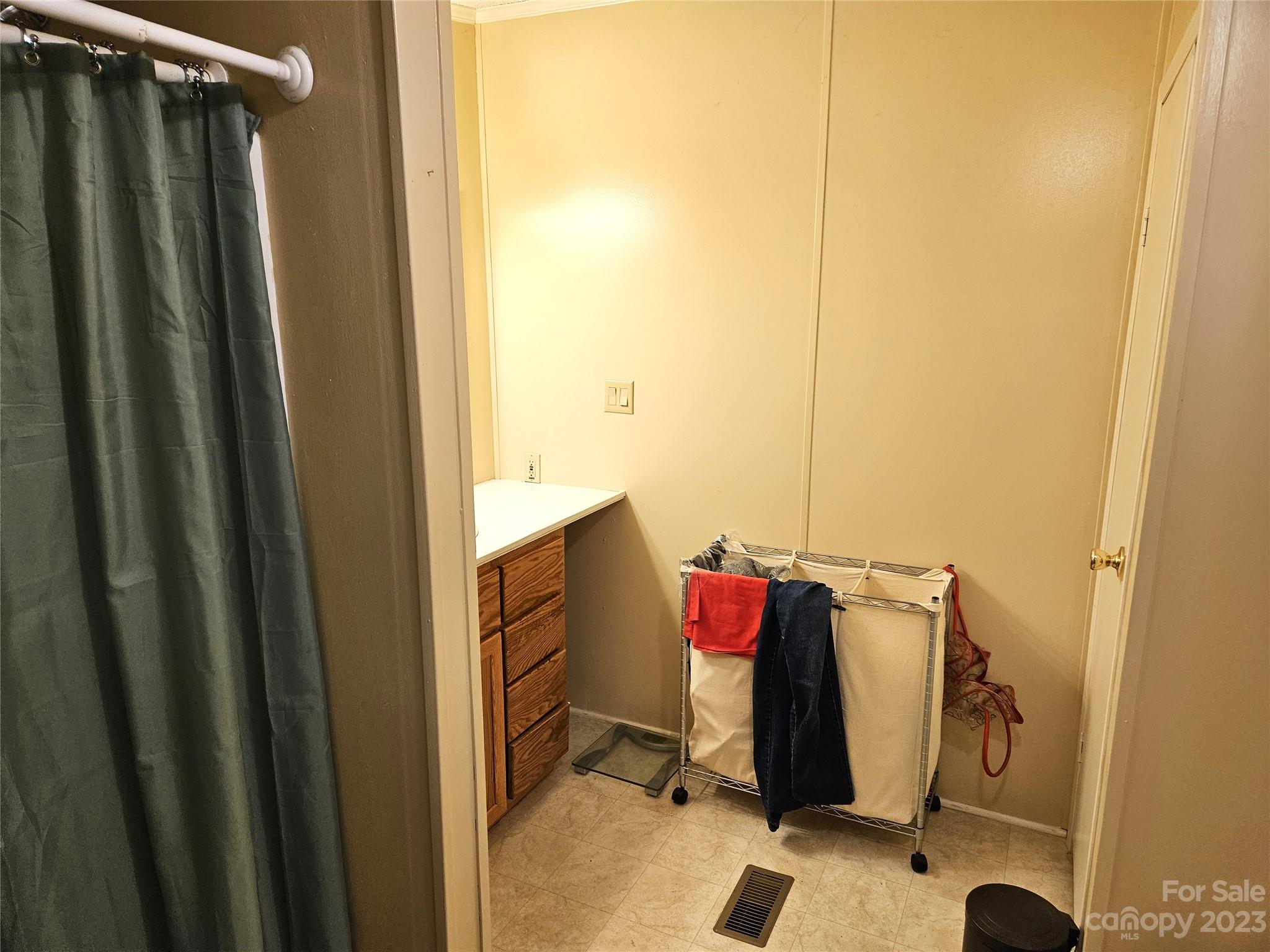 2955 Piney Road Morganton, NC 28655 - Photo 23 of 43 a view of walk in closet with clothes and shoes