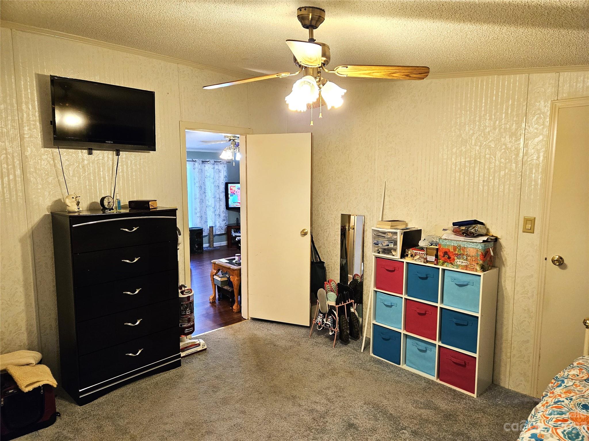 2955 Piney Road Morganton, NC 28655 - Photo 25 of 43 a view of a livingroom with furniture and a ceiling fan