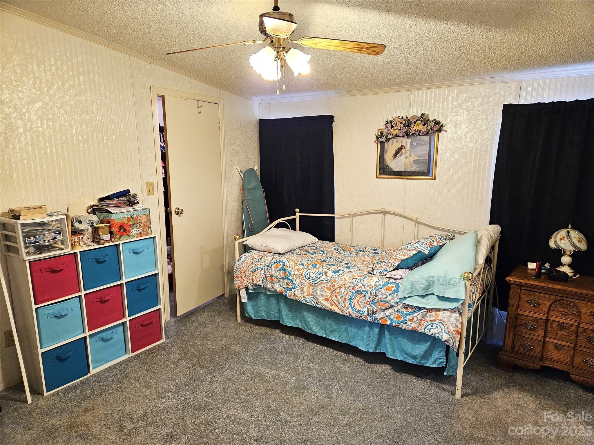 2955 Piney Road Morganton, NC 28655 - Photo 26 of 43 a bedroom with a bed and a dresser