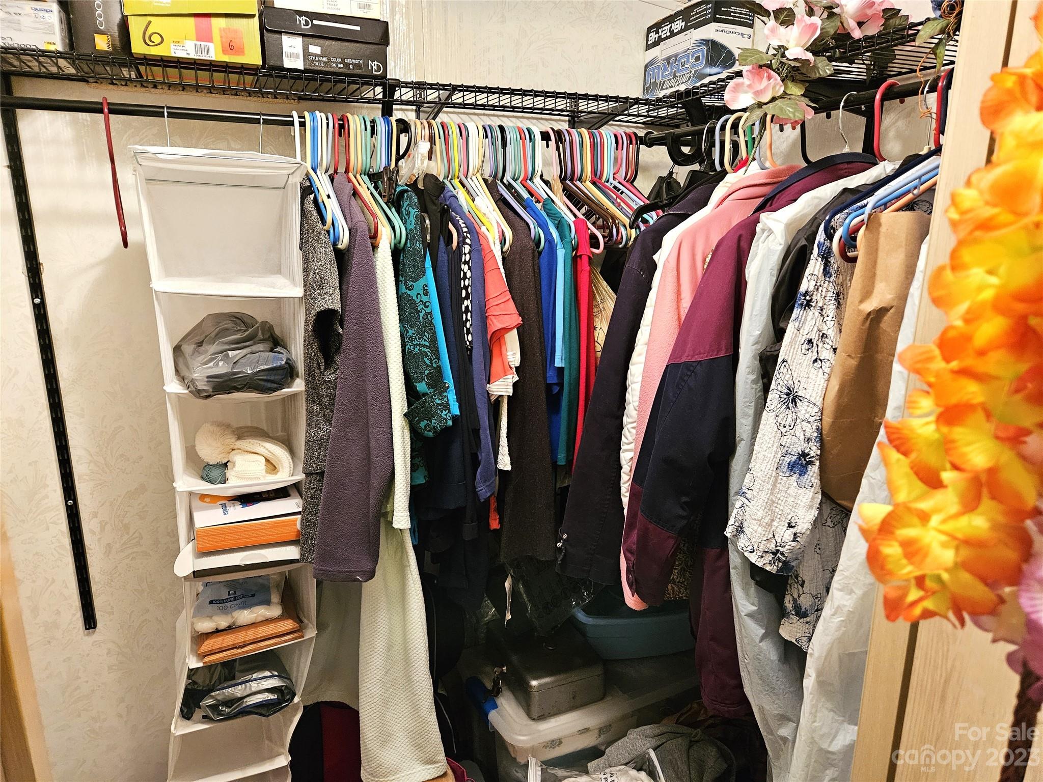 2955 Piney Road Morganton, NC 28655 - Photo 28 of 43 a view of walk in closet with clothes and shoes