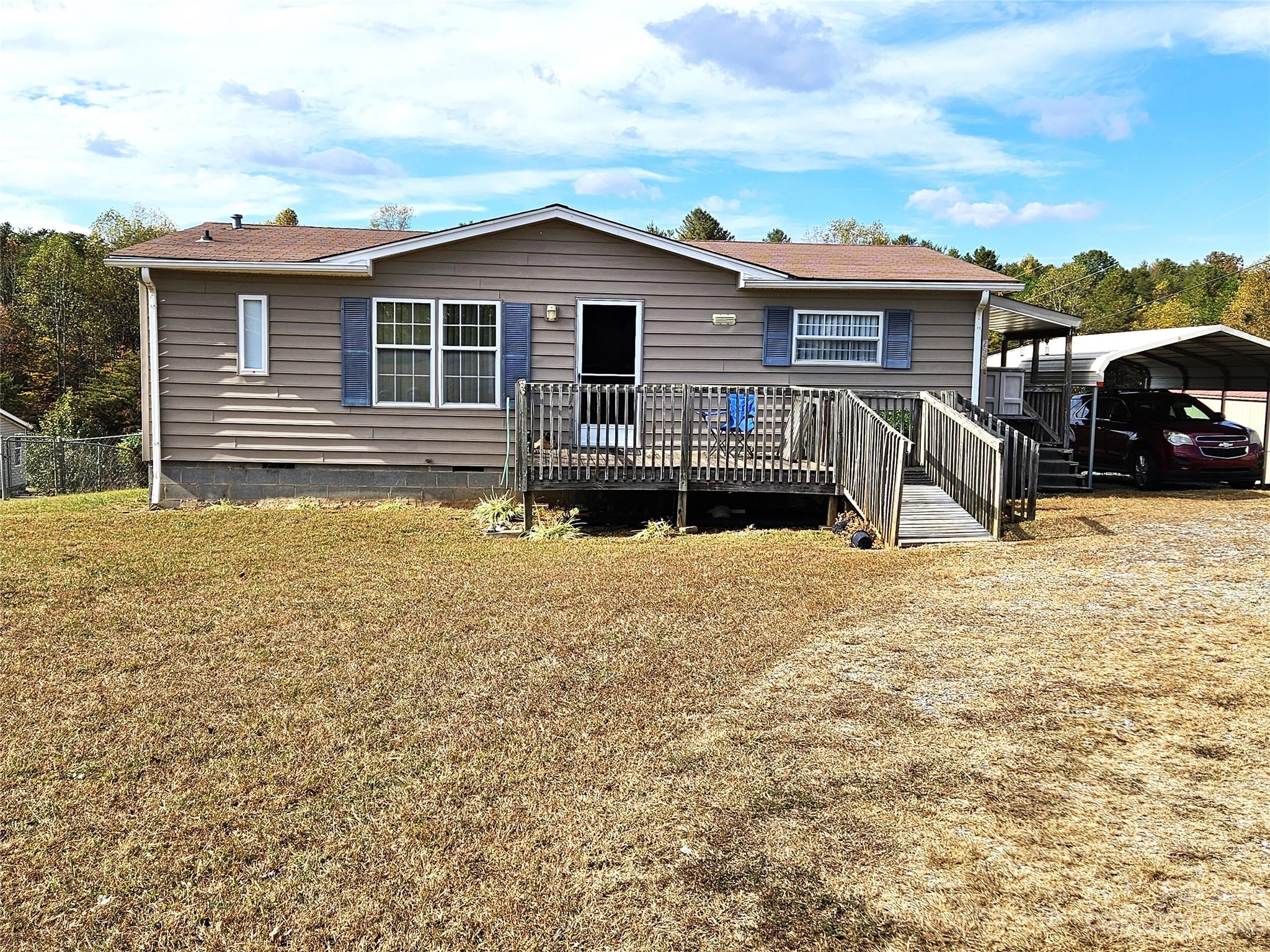 2955 Piney Road Morganton, NC 28655 - Photo 3 of 43 a front view of a house with cars parked