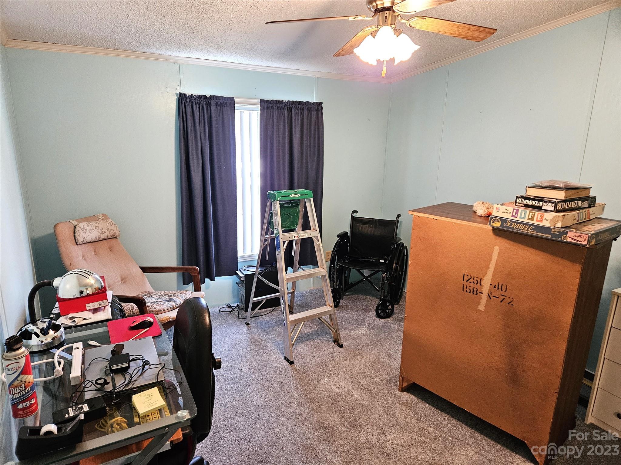 2955 Piney Road Morganton, NC 28655 - Photo 33 of 43 a bedroom with furniture and a chandelier