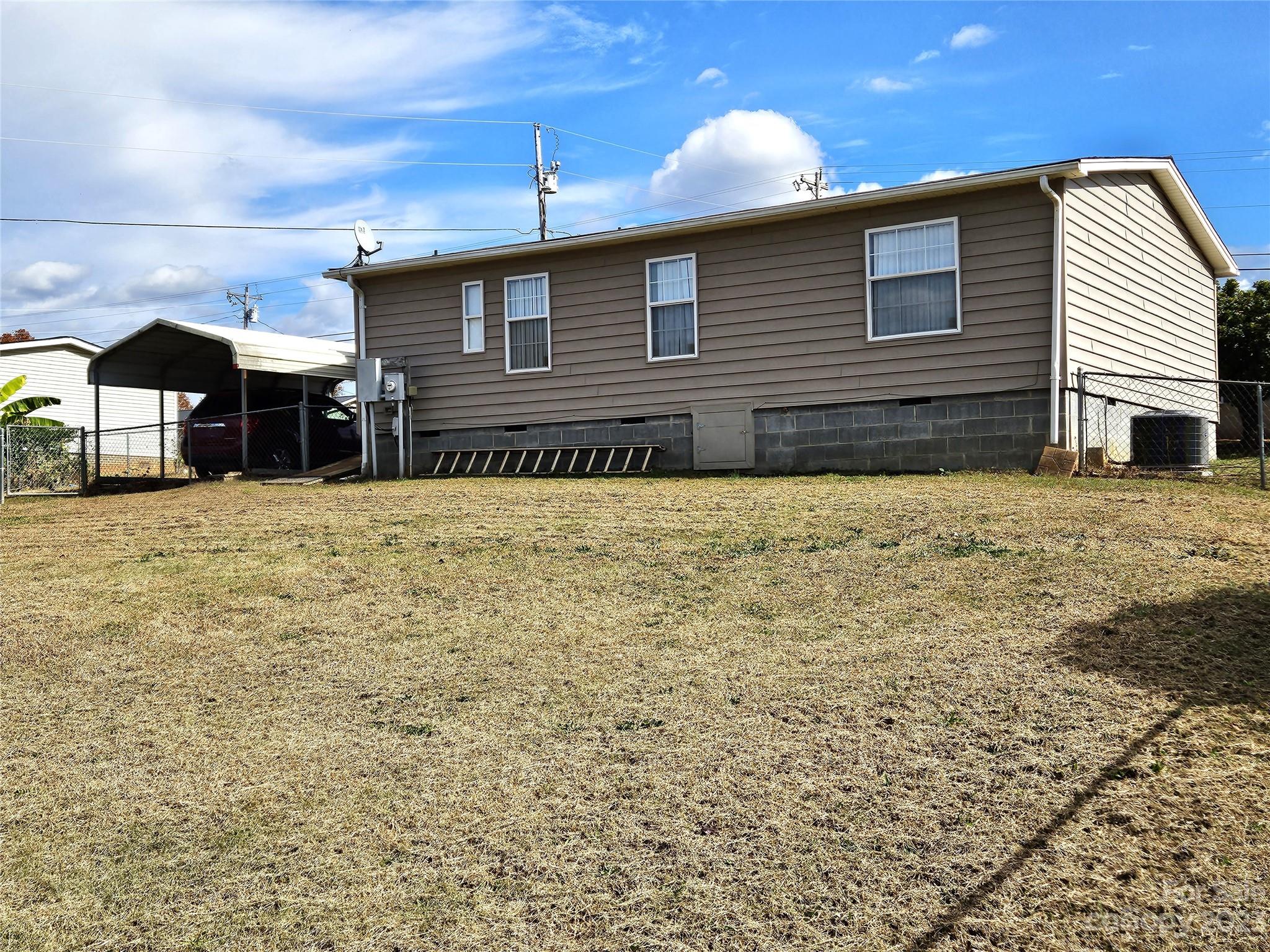 2955 Piney Road Morganton, NC 28655 - Photo 38 of 43 a view of a house with a yard