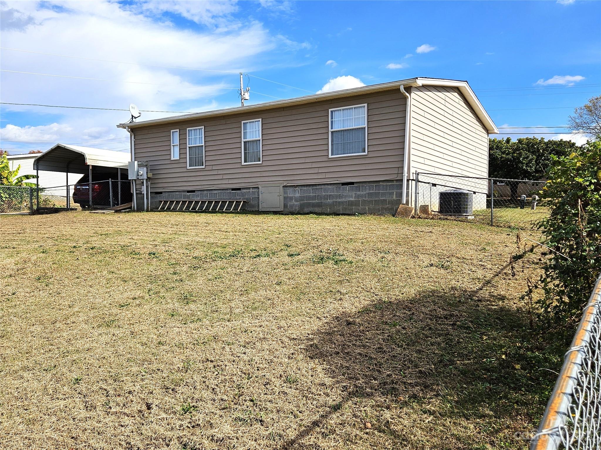 2955 Piney Road Morganton, NC 28655 - Photo 39 of 43 a front view of a house with a yard