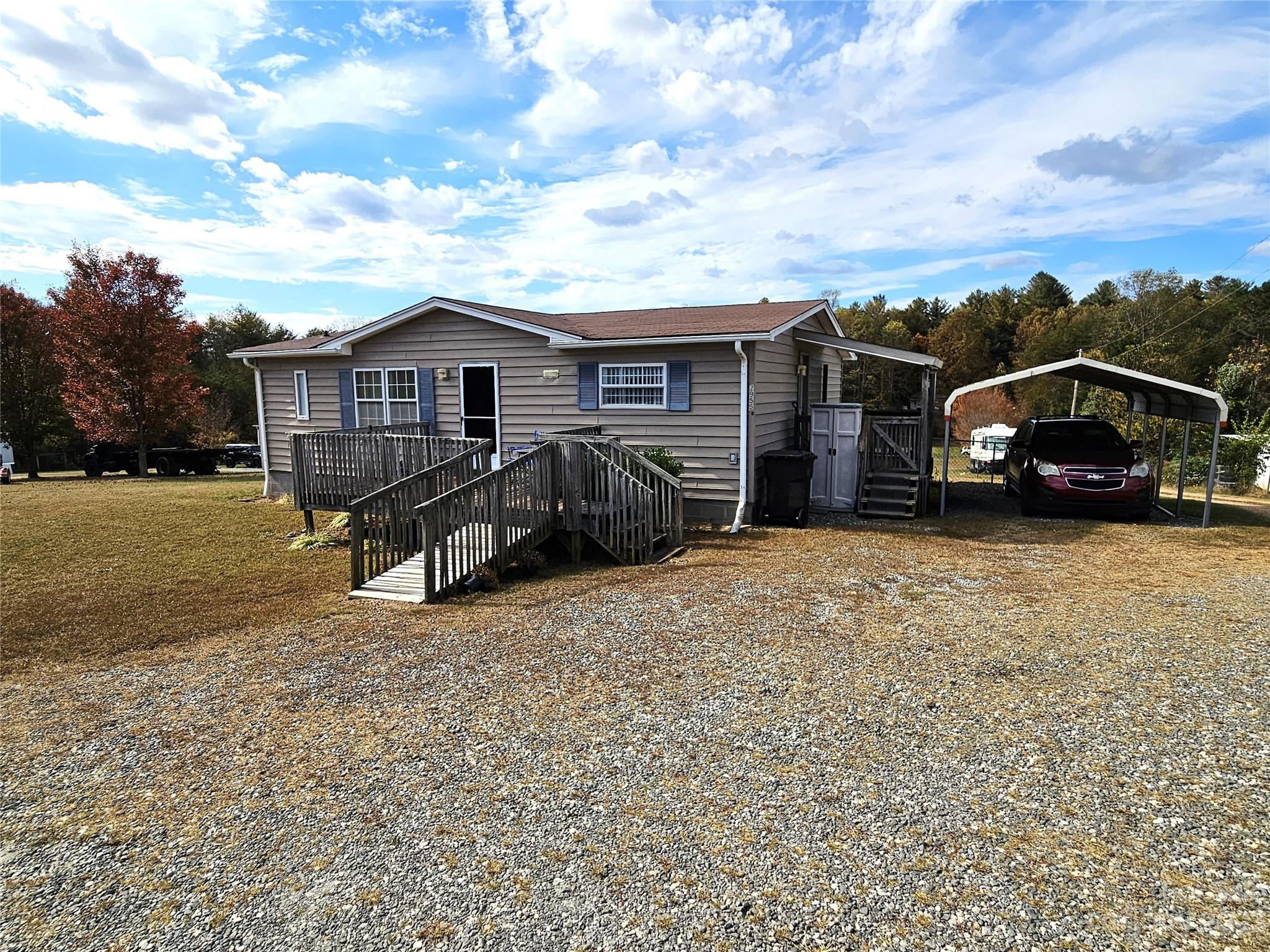 2955 Piney Road Morganton, NC 28655 - Photo 5 of 43 a view of a car parked in front of a house
