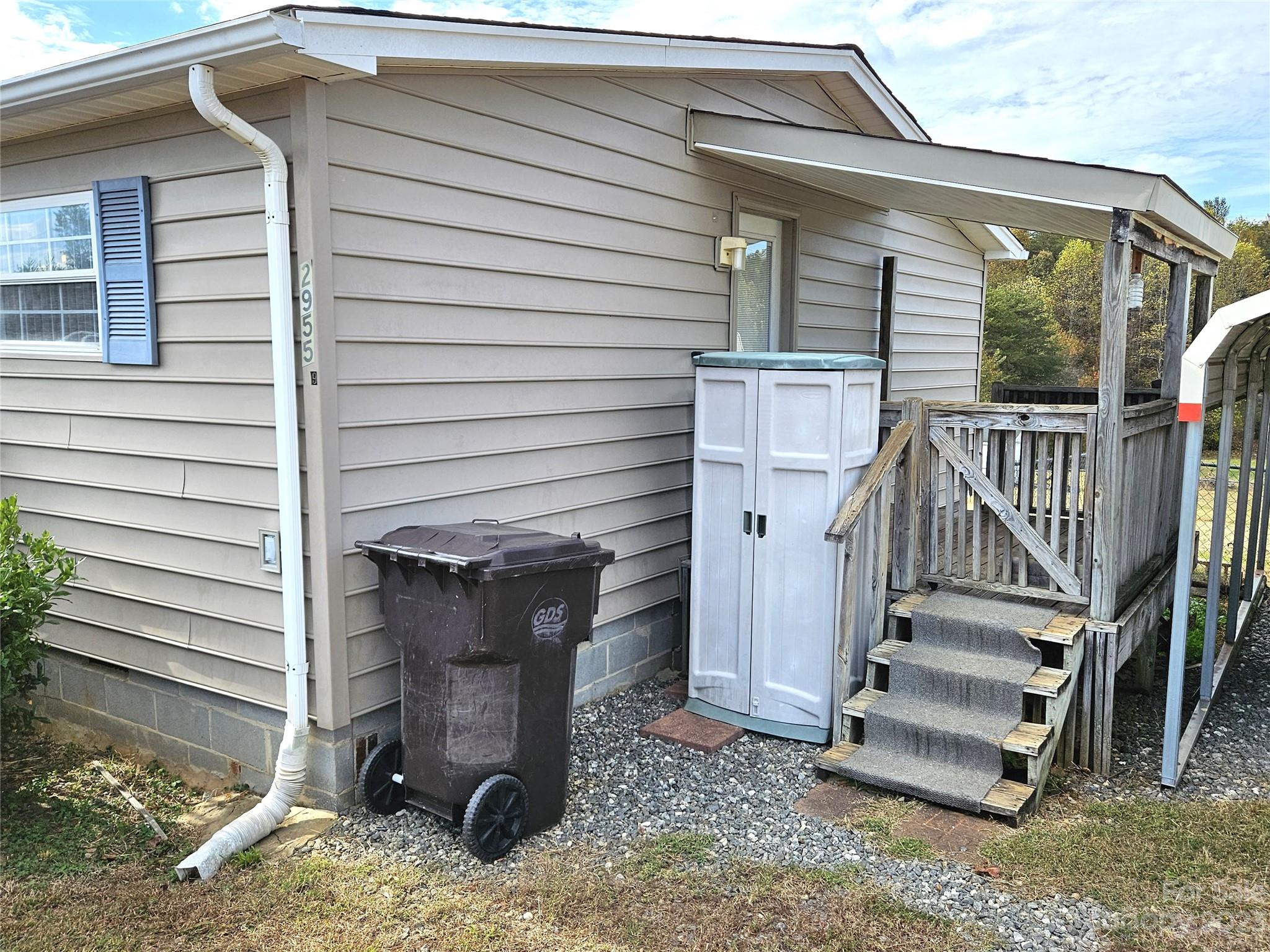 2955 Piney Road Morganton, NC 28655 - Photo 6 of 43 a view of a house with wooden floor next to a road