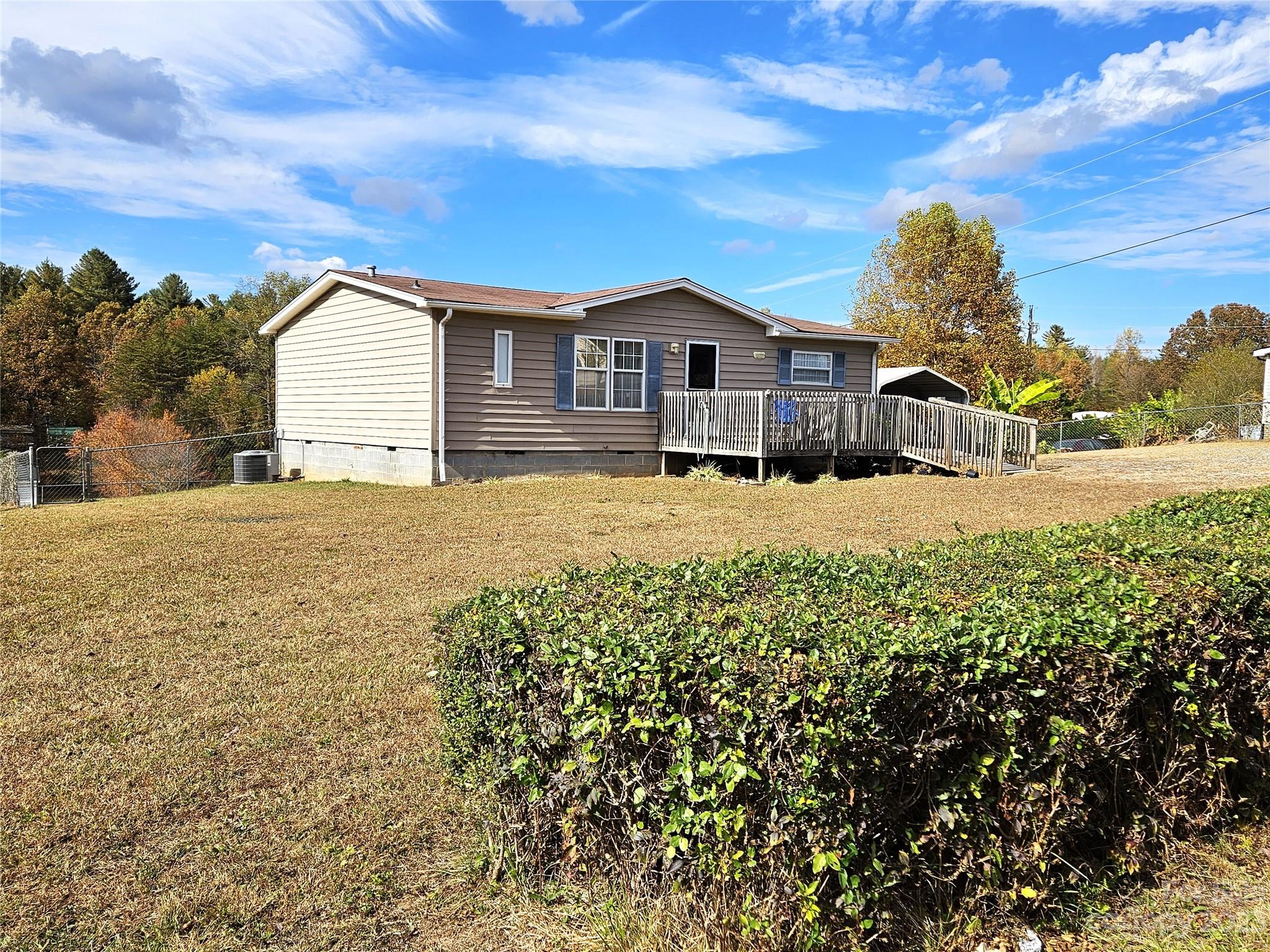 2955 Piney Road Morganton, NC 28655 - Photo 9 of 43 a front view of a house with a yard