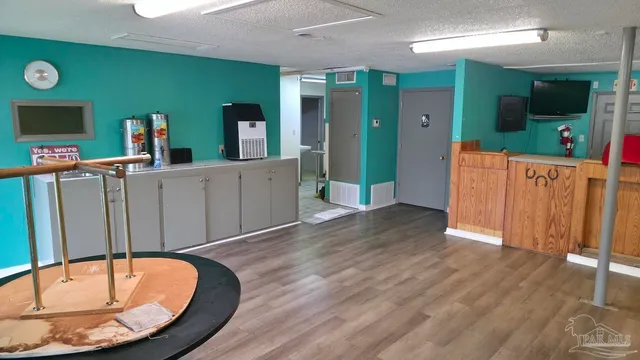 an outdoor space with seating area and furniture