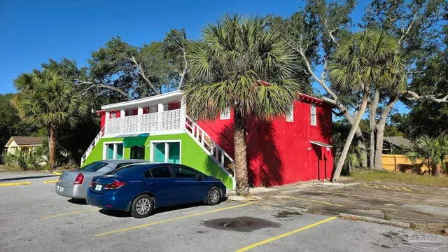 a view of street with parked cars