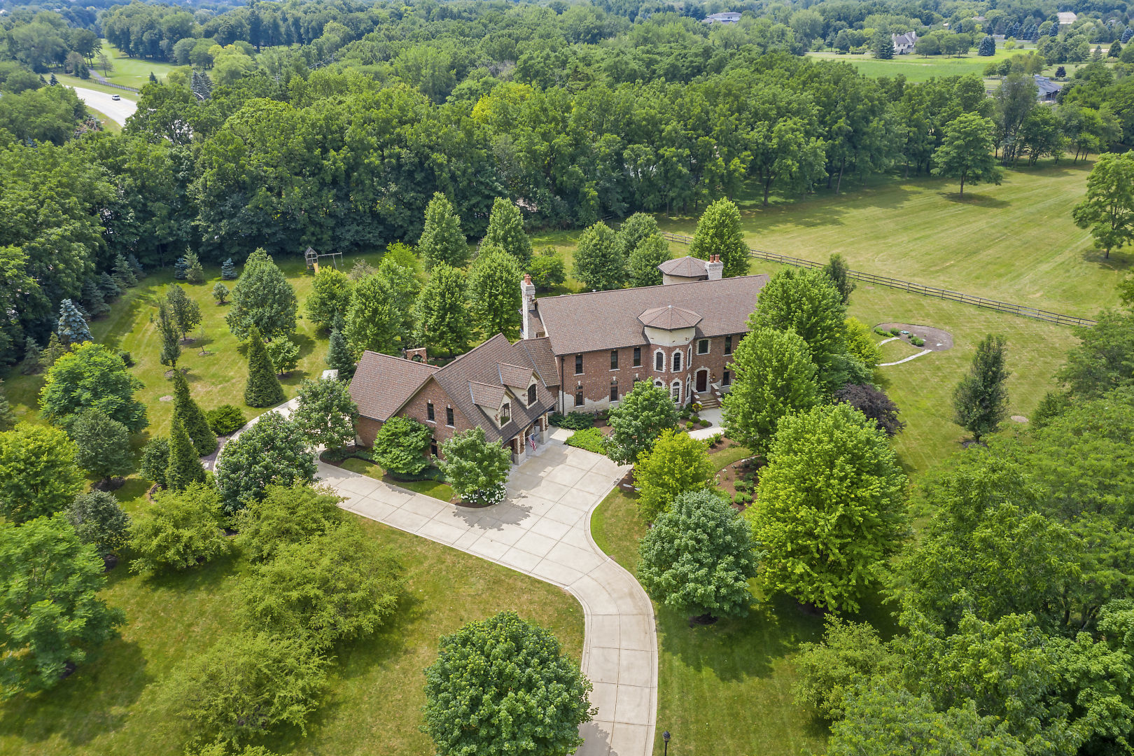 33W571 White Thorne Road St. Charles, IL 60174 - Photo 1 of 46 an aerial view of residential house with outdoor space and swimming pool