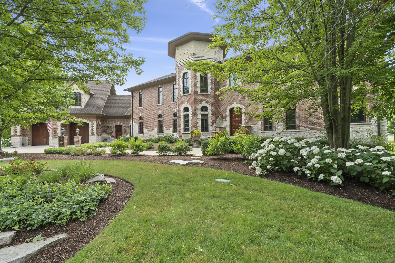33W571 White Thorne Road St. Charles, IL 60174 - Photo 2 of 46 a front view of a house with garden