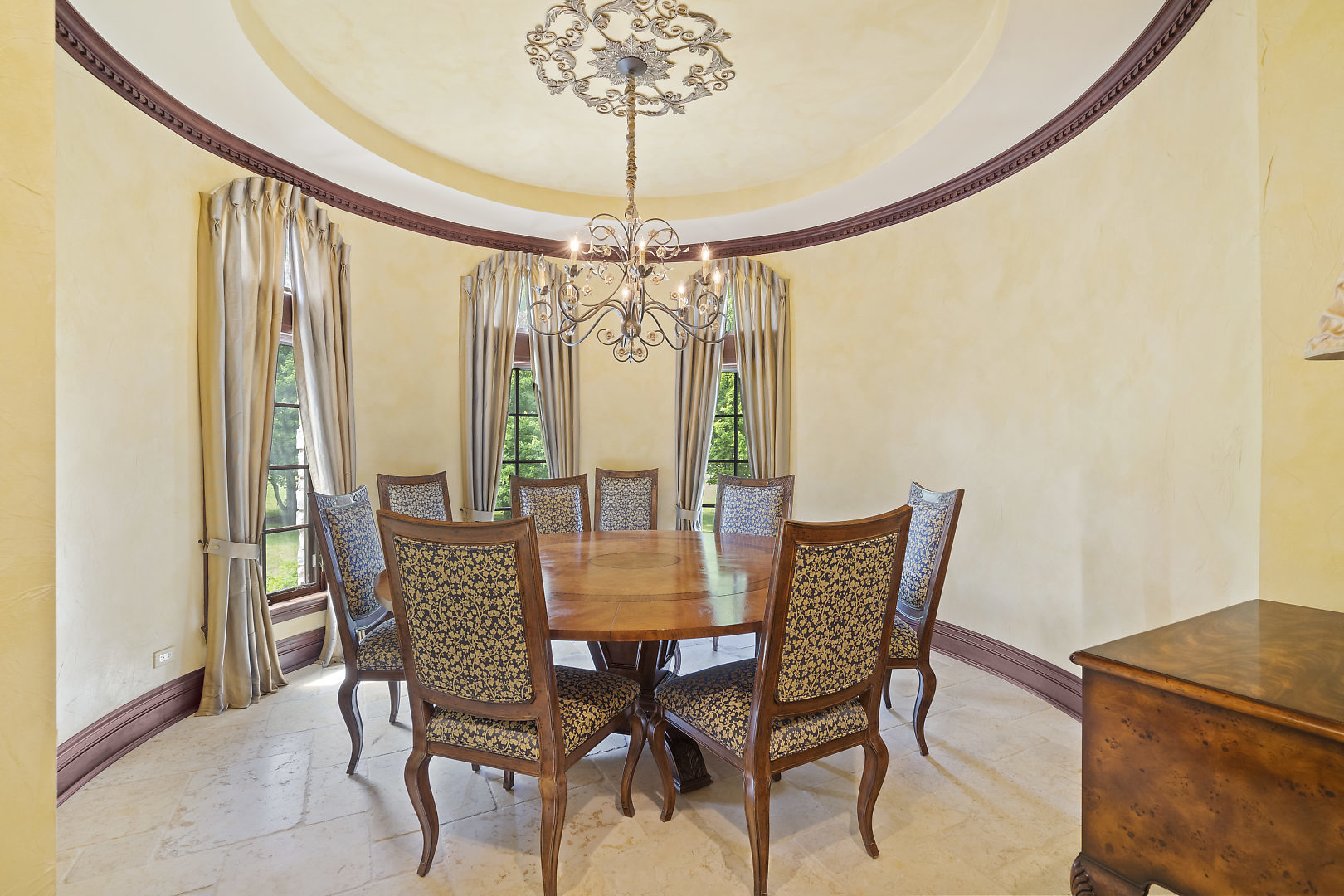 33W571 White Thorne Road St. Charles, IL 60174 - Photo 11 of 46 a view of a dining room with furniture and chandelier