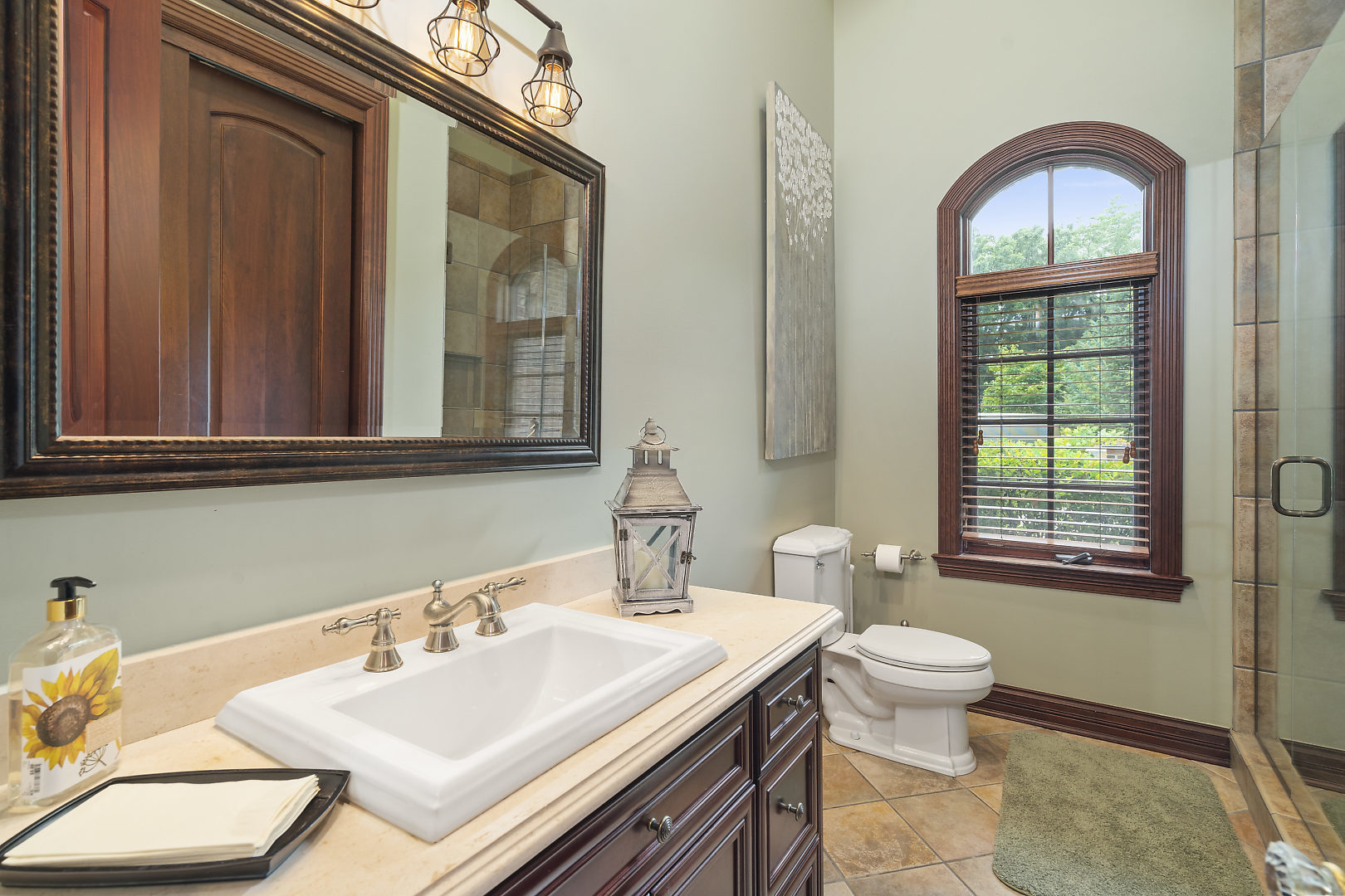 33W571 White Thorne Road St. Charles, IL 60174 - Photo 23 of 46 a bathroom with a sink and a mirror