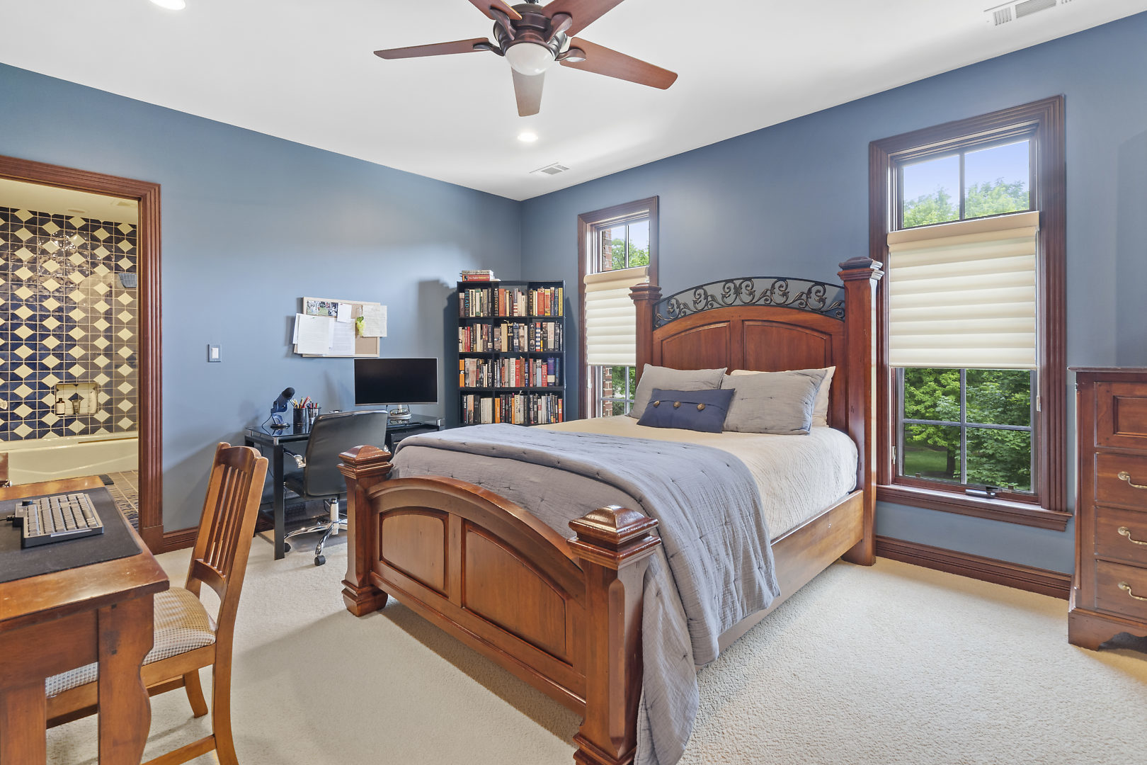 33W571 White Thorne Road St. Charles, IL 60174 - Photo 28 of 46 a bedroom with a bed a bookshelf and a window