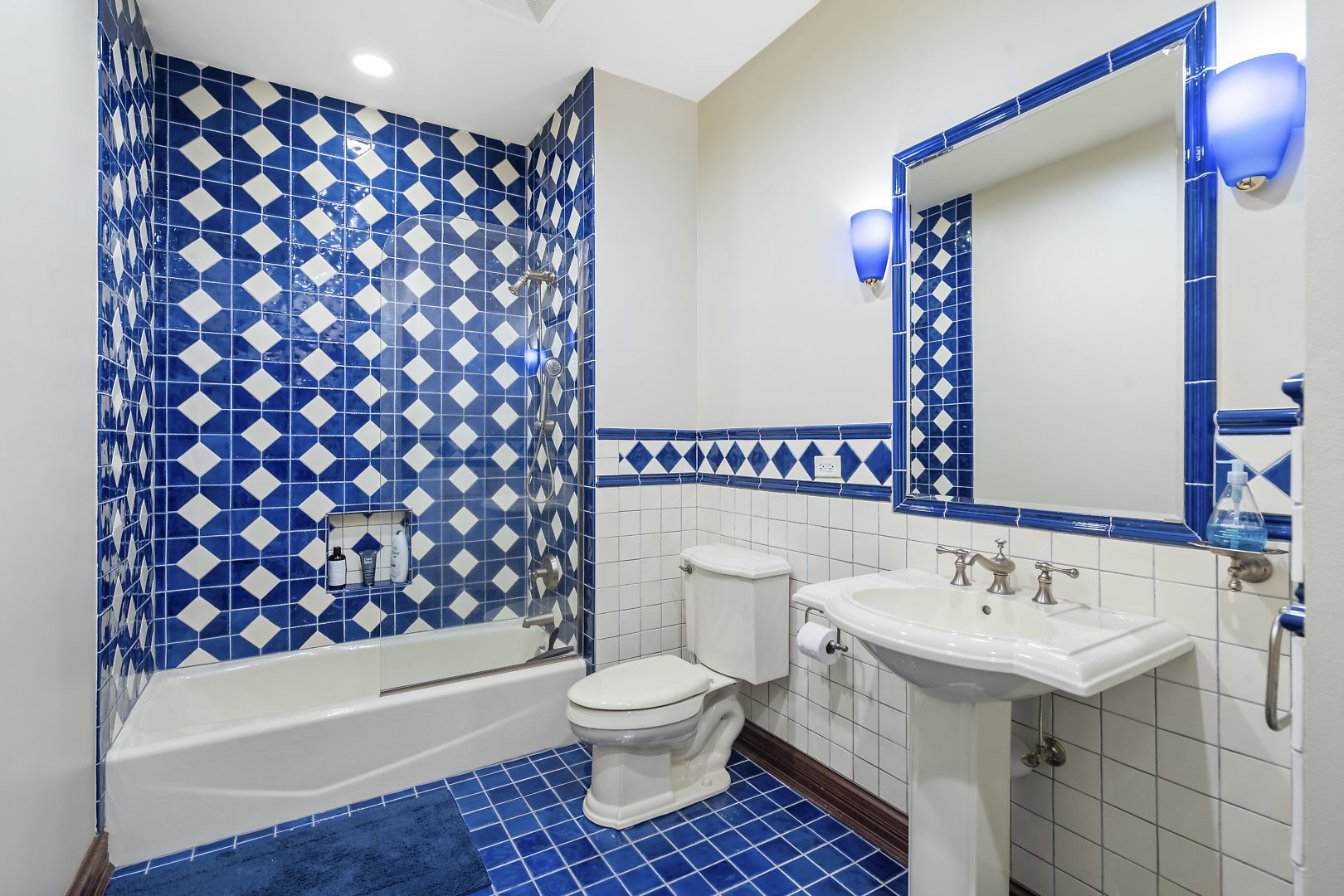 33W571 White Thorne Road St. Charles, IL 60174 - Photo 29 of 46 a bathroom with a sink toilet and shower