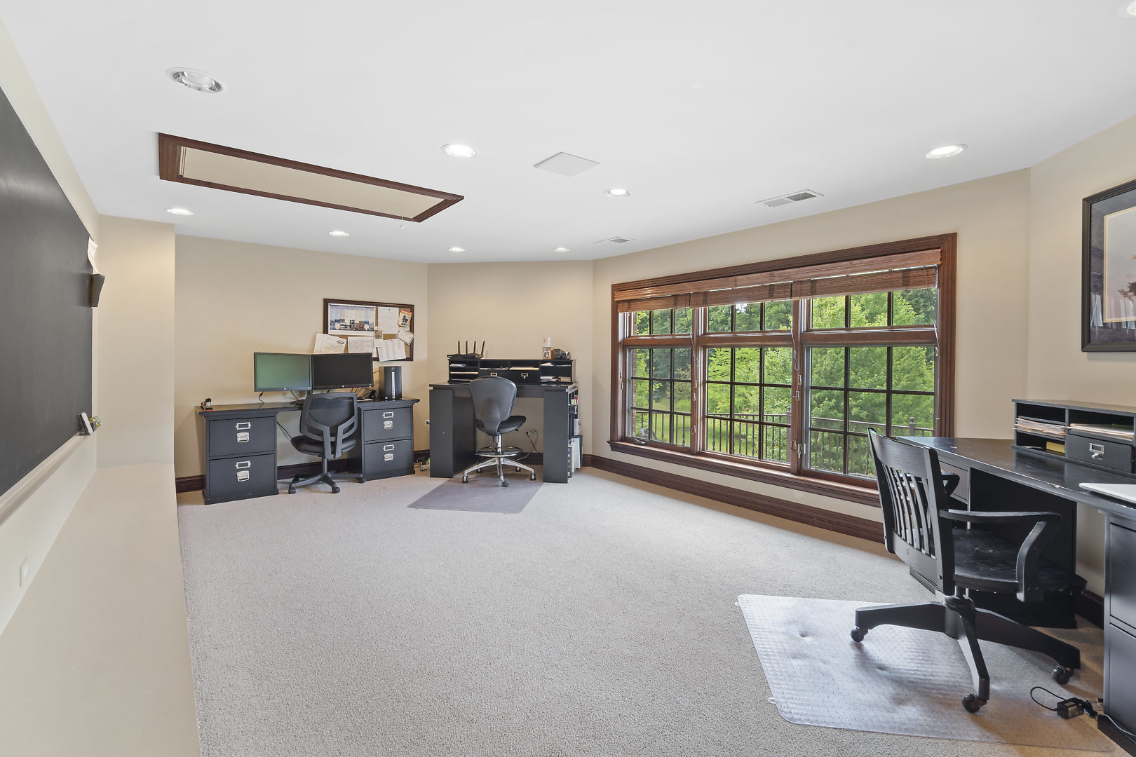 33W571 White Thorne Road St. Charles, IL 60174 - Photo 30 of 46 a view of a workspace with furniture and a window
